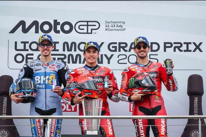 Dari kiri ke kanan, Alex Marquez (Gresini), Marc Marquez (Ducati), dan Francesco Bagnaia (Ducati) di podium MotoGP Jerman 2025 di Sachsenring, Minggu (13/7/2025).