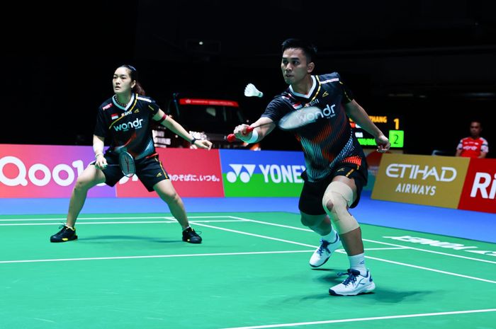 Ganda campuran Indonesia, Amri Syahnawi/Nita Violina Marwah, bertanding pada babak pertama Japan Open 2025 di Tokyo, Jepang, 15 Juli 2025. Amri/Nita  sukses tumbangkan ganda campuran China.