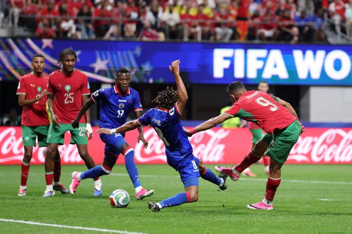 Striker Maroko Sofiane Rahimi mencetak gol untuk Haiti pada laga terakhir Grup C Piala Dunia 2026.