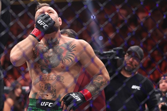 Reaksi Conor McGregor setelah mengalami cedera kaki dan kalah pada ronde pertama dalam pertarungannya melawan Max Holloway dalam pertarungan kelas welter di UFC 329 di T-Mobile Arena pada 11 Juli 2026 di Las Vegas, Nevada, Amerika Serikat.
