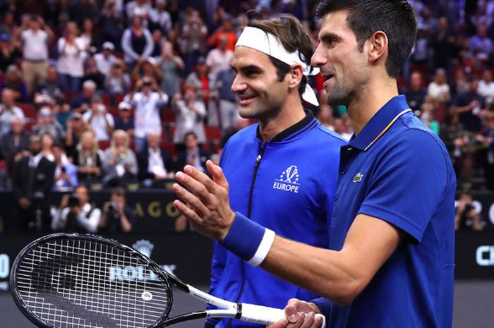 Novak Djokovic (kanan depan) berpasangan dengan Roger Federer di turnamen Laver Cup 2018.