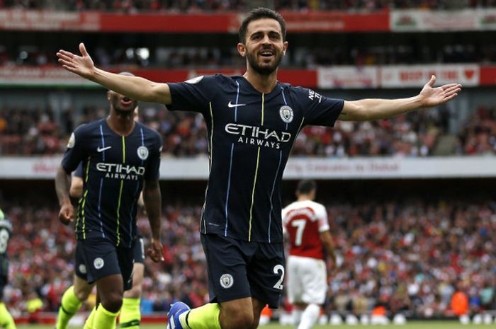 Gelandang Manchester City, Bernardo Silva, merayakan gol yang dicetaknya dalam laga melawan Arsenal di Emirates Stadium, 12 Agustus 2018.