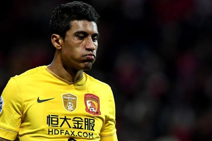 Ekspresi gelandang Guangzhou Evergrande, Jose Paulo Bezzera Maciel Junior alias Paulinho, dalam pertandingan Liga CHampions Asia 2016 menghadapi Urawa Red Diamonds di Stadion Saitama, Saitama, Jepang, pada 5 April 2016.