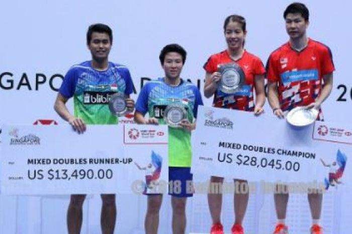 Pasangan ganda campuran Malaysia, Goh Soon Huat/Shevon Jemie Lai, sukses merebut gelar Singapore Open 2018 usai mengalakan Tontowi Ahmad/Liliyana Natsir (Indonesia). 