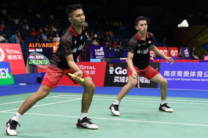 Pasangan ganda putra nasional Indonesia, Fajar Alfian/Muhammad Rian Ardianto, saat menjalani pertandingan melawan Jacco Arends/Ruben Jille (Belanda) pada babak kedua Kejuaraan Dunia 2018 di Nanjing Olympic Sports Centre, Nanjing, China, Rabu (1/8/2018).