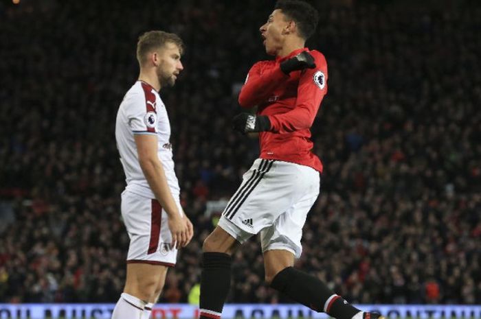 Pemain Manchester United, Jesse Lingard, merayakan gol kontra Burnley pada laga Liga Inggris di Stadion Old Trafford, Manchester, Selasa (26/12/2017).