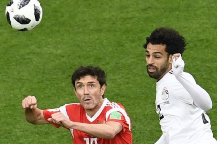 Aksi Mohamed Salah dalam partai Rusia vs Mesir di St. Petersburg, 19 Juni 2018. 