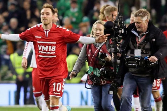 Christian Eriksen merayakan kemenangan timnas Denmark atas Republik Irlandia pada partai kedua babak play-off Kualifikasi Piala Dunia 2018 zona Eropa di Stadion Aviva, Dublin, Rabu (15/11/2017) dini hari WIB.