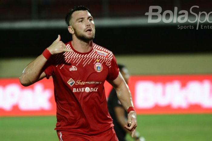 Bomber Persija Jakarta, Marko Simic, merayakan golnya setelah membobol gawang PSPS Riau pada pertandingan lanjutan Grup D Piala Presiden 2018 di Stadion Kapten I Wayan Dipta, Jumat (19/1/2018). 