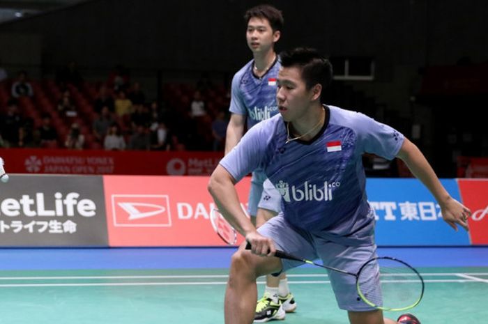 Pasangan ganda putra Indonesia, Marcus Fernaldi Gideon/Kevin Sanjaya Sukamuljo, saat menjalani laga melawan Kim Astrup/Anders Skaarup Rasmussen (Denmark) pada babak perempat final turnamen Jepang Terbuka di Tokyo Metropolitan Gymnasium, Jumat (22/9/2017). Marcus/Kevin menang dengan skor 21-19, 22-20.