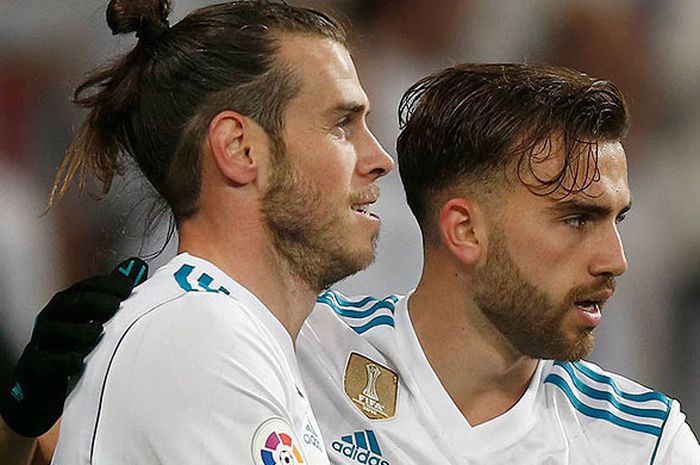 Pemain Real Madrid, Gareth Bale (kiri) merayakan gol yang dicetak rekan setimnya, Borja Mayoral (kanan) saat melawan Fuenlabrada di partai leg II Copa del Rey (28/11).