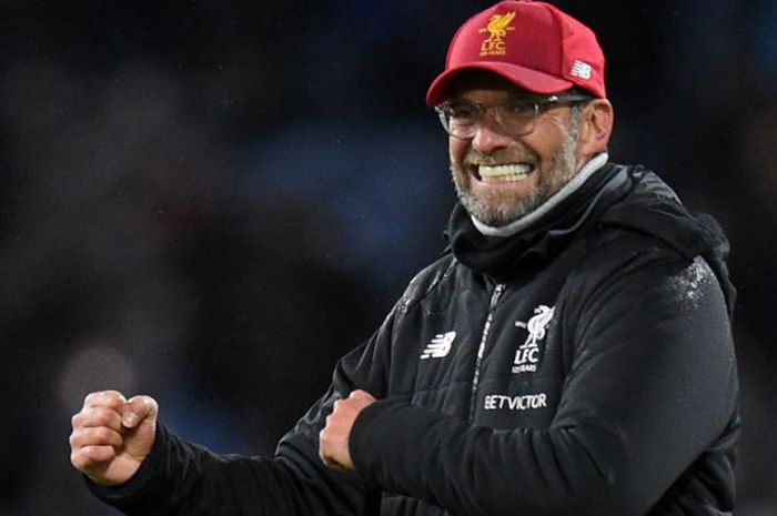 Pelatih Liverpool, Juergen Klopp, merayakan kemenangan kontra Burnley pada laga Liga Inggris di Turf Moor, Burnley, 1 Januari 2018.