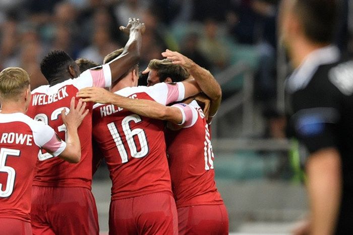 Para pemain Arsenal merayakan gol yang dicetak ke gawang Qarabag dalam laga Grup E Liga Europa di Baku, Azerbaijan pada 4 Oktober 2018.