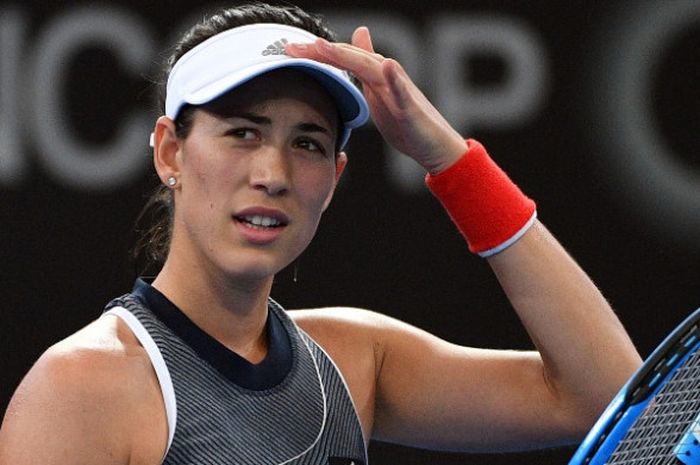 Petenis putri Spanyol, Garbine Muguruza, bereaksi saat menjalani laga melawan Aleksandra Krunic (Serbia) pada babak kedua turnamen Brisbane Internasional 2018, di Pat Rafter Arena, Selasa (2/1).