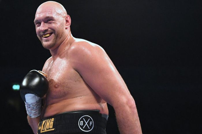 Ekspresi Tyson Fury (Inggris) setelah mengalahkan Sefer Seferi (Albania) di Manchester Arena, Inggris pada Sabtu (9/6/2018) waktu setempat.