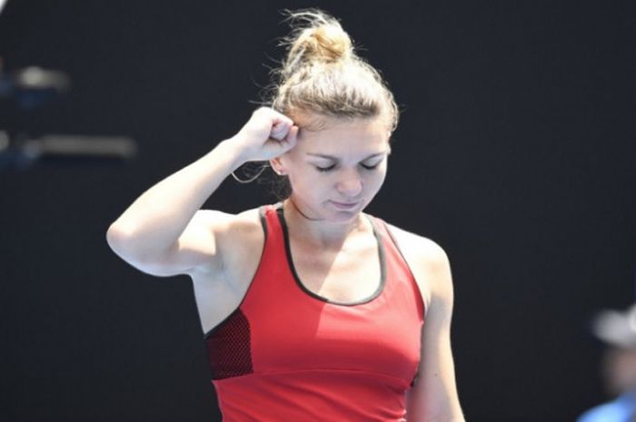 Ekspresi Simona Halep saat menjalani pertandingan babak 32 besar Australian Open 2018 melawan Lauren Davis pada Sabtu (20/1/2018).