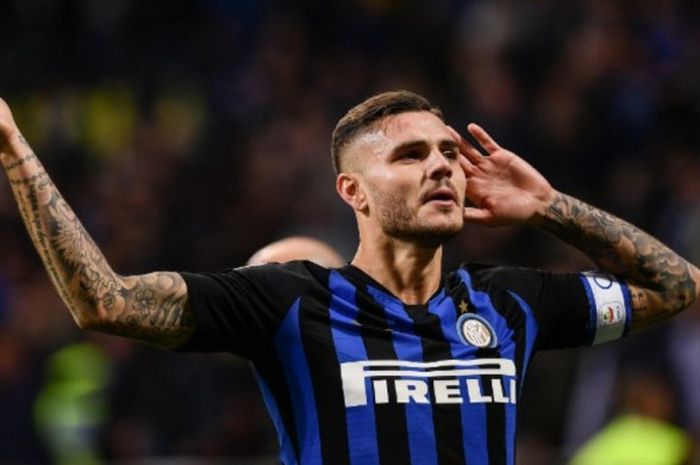 Penyerang Inter Milan, Mauro Icardi, merayakan golnya ke gawang AC Milan dalam partai Liga Italia di Giuseppe Meazza, 21 Oktober 2018.