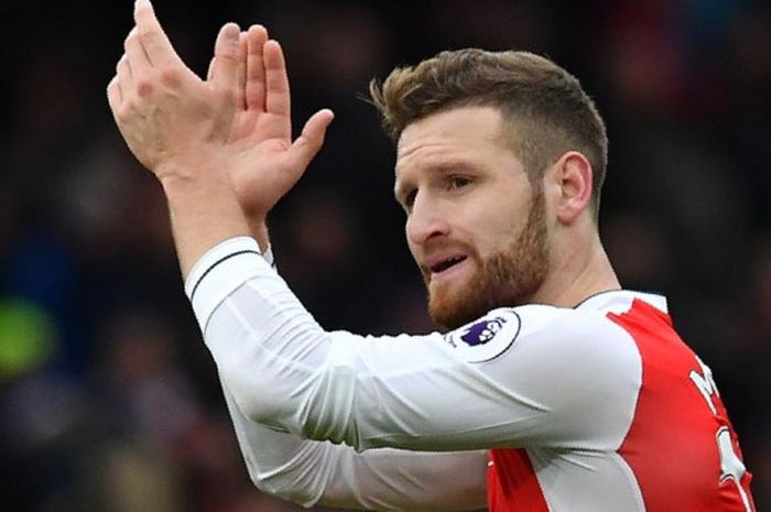 Reaksi bek Arsenal, Shkodran Mustafi, dalam partai Liga Inggris melawan Tottenham Hotspur di Emirate