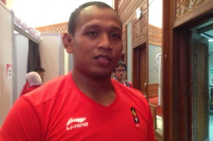 Pegulat nasional, Papang Ramadhani, setelah mengalami kekalahan di babak perempat final nomor 130 kilogram gaya greco-roman cabang gulat Asian Games 2018 di Assembly Hall, JCC Senayan, Rabu (22/8/2018).