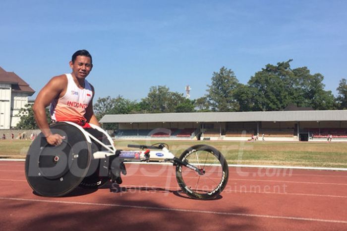 Sprinter kursi roda Indonesia, Jaenal Arifin, setelah berlatih di Stadion Sriwedari, Solo, Kamis (6/9/2018).