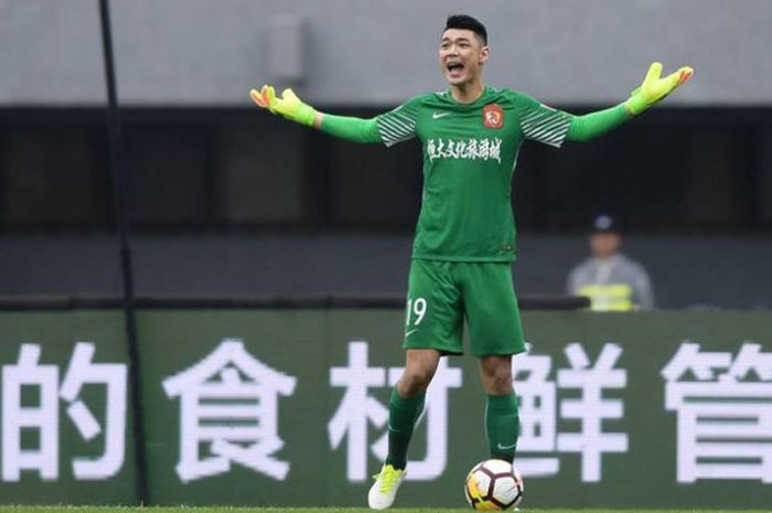 Ekspresi kecewa kiper Guangzhou Evergrande, Zeng Cheng saat timnya dikalahkan Beijing Renhe pada lanjutan Liga Super China 2018, 20 Mei 2018. 