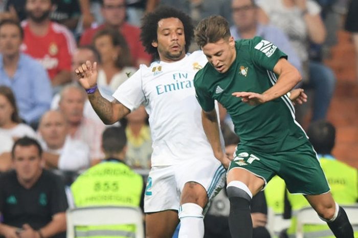 Bek Real Madrid, Marcelo (kiri), dalam laga kontra Real Betis di Santiago Bernabeu pada Rabu (20/9/2017)