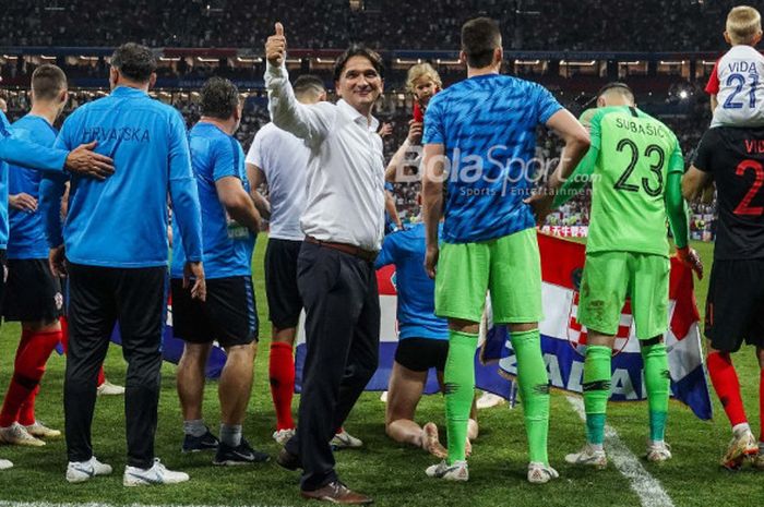 Pelatih Kroasia, Zlatko Dalic, merayakan kemenangan timnya atas Inggris di semifinal Piala Dunia 2018 di Luzhniki Stadium, Kamis (12/7/2018).  