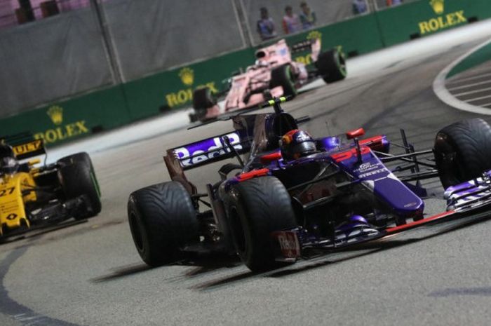 Carlos Sainz, Joylon Palmer, dan Sergio Perez meraih posisi terbaik selama karir mereka saat tampil di GP Singapura (17/9/2017).