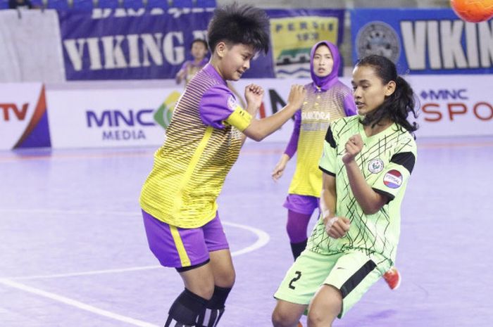 Kapten IKIP Budi Utomo, Mita Alfiana berhasil membawa klubnya promosi ke liga pro futsal musim depan.