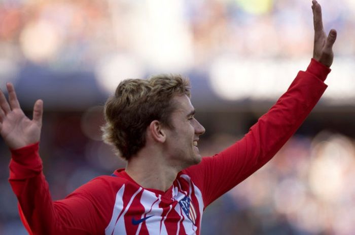 Penyerang Atletico Madrid, Antoine Griezmann, melakukan selebrasi setelah mencetak gol ke gawang Malaga pada laga lanjutan Liga Spanyol di Stadion La Rosaleda, Sabtu (10/2/2018) waktu setempat.