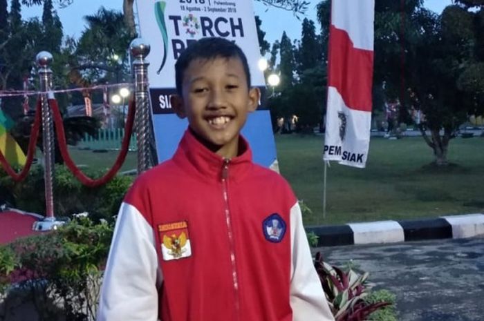 Buffon Julianto Sinaga, karateka cilik asal Siak, yang dipercaya menjadi salah satu atlet dalam kirab obor Asian Games pada 1 Agustus 2018.