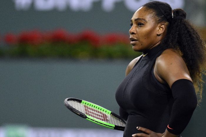 Reaksi petenis tunggal putri Amerika Serikat (AS), Serena Williams, saat menjalani laga melawan Zarina Diyas (Kazakhstan) pada laga babak kesatu turnamen Indian Wells Masters 2018 di Indian Wells, California, AS, Kamis (8/3/2018) waktu setempat.