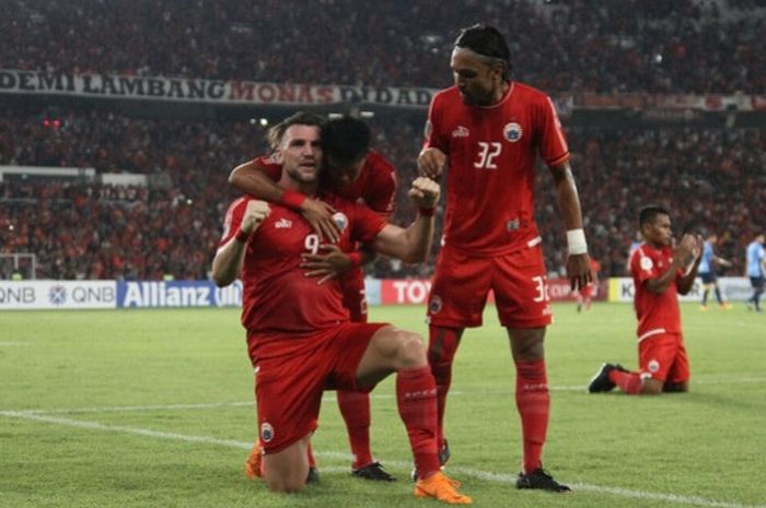  Selebrasi penyerang Persija, Marko Simic, usai menjebol gawang Johor Darul Takzim dalam penyisihan Grup H Piala AFC di Stadion Utama Gelora Bung Karno, Selasa (10/4/2018) 