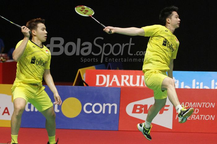 Pasangan ganda putra Indonesia, Marcus Fernaldi Gideon/Kevin Sanjaya Sukamuljo, pada final Indonesia Masters 2018 di Istora Senayan, Jakarta, Minggu (28/1/2018).