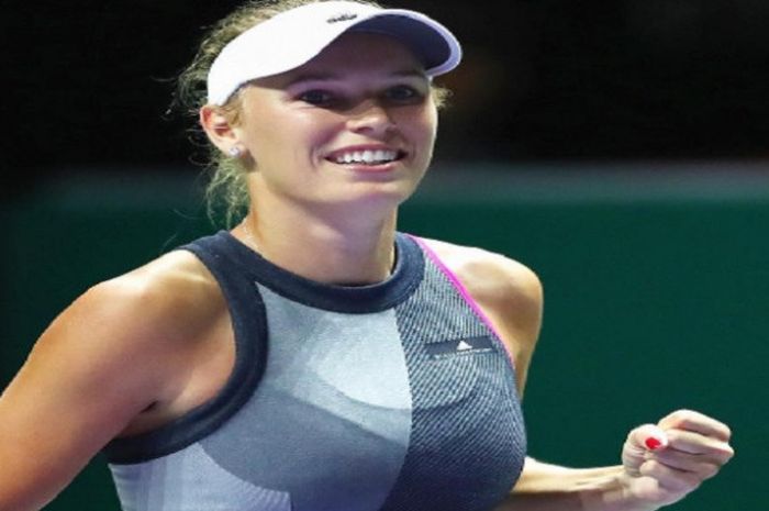 Petenis Denmark, Caroline Wozniacki, saat tampil pada WTA Finals 2017 yang digelar di Singapura.