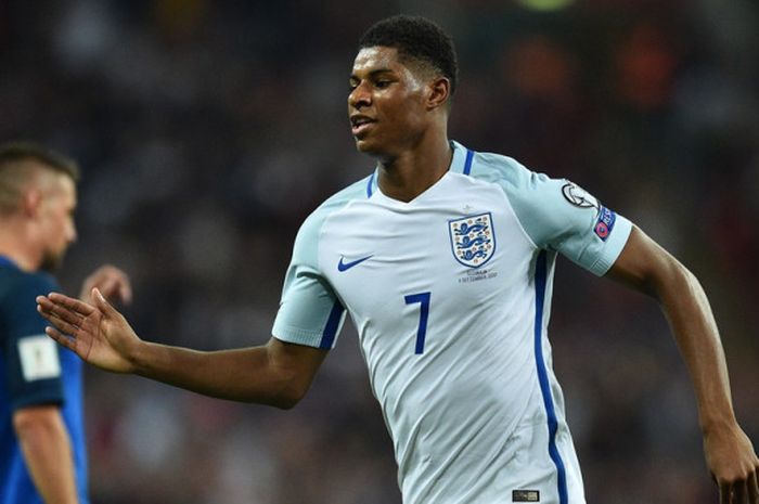 Penyerang Inggris, Marcus Rashford, merayakan golnya ke gawang Slovakia dalam laga Kualifikasi Piala Dunia 2018 Zona Eropa di Stadion Wembley, London, Inggris pada 4 September 2017.