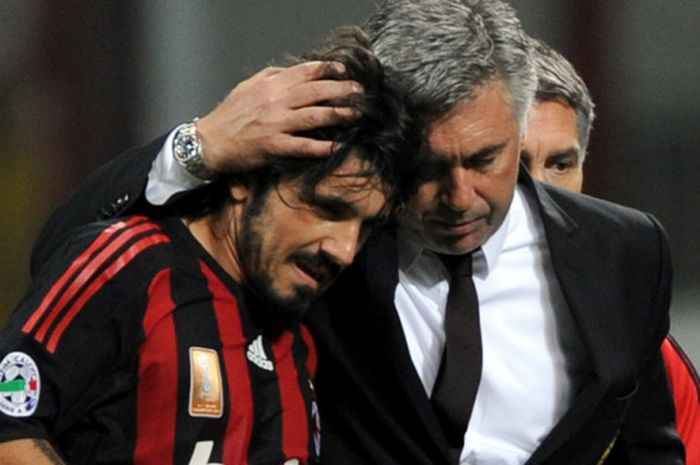 Carlo Ancelotti (kanan) dan Gennaro Gattuso dalam partai Liga Italia antara AC Milan lawan Lazio di Stadion San Siro, Milan, 21 September 2008.