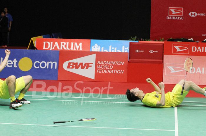 Pasangan ganda putra Indonesia, Marcus Fernaldi Gideon/Kevin Sanjaya Sukamuljo, pada final Indonesia Masters 2018 di Istora Senayan, Jakarta, Minggu (28/1/2018).