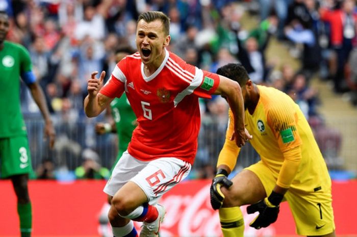 Pemain Rusia, Denis Cheryshev, merayakan golnya ke gawang Arab Saudi dalam laga Grup A Piala Dunia 2018 di Stadion Luzhniki, Moskow, Rusia pada 14 Juni 2018.