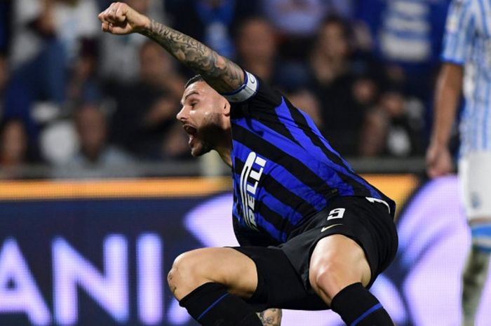 Bomber Inter Milan, Mauro Icardi, melakukan selebrasi setelah mencetak gol ke gawang SPAL pada laga lanjutan Liga Italia di Stadion Paolo Mazza, Minggu (7/10/2018) waktu setempat.