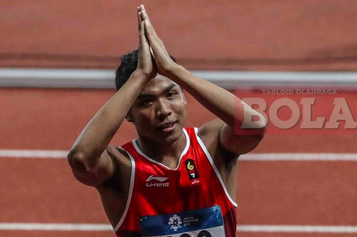 Sprinter asal Indonesia, Lalu Muhammad Zohri bereaksi seusai final nomor lari 100 meter putra cabang atletik Asian Games 2018 di Stadion Utama Gelora Bung Karno, Jakarta, Minggu (26/8/2018).