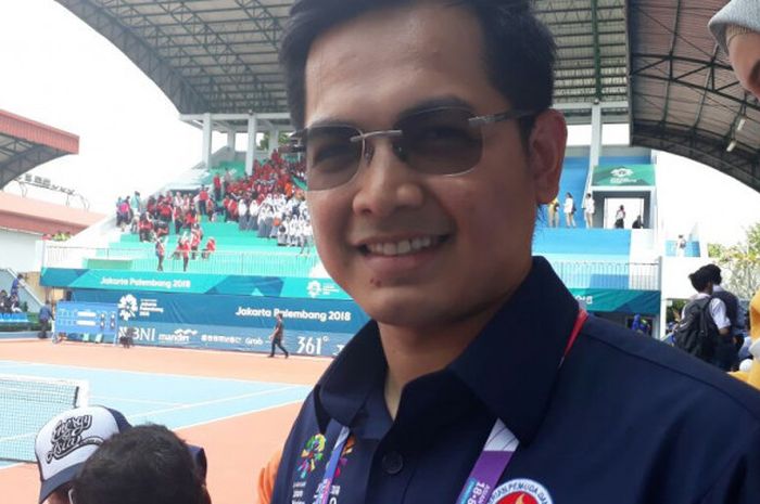 Aktor peran Tommy Kurniawan ketika menyaksikan final soft tenis tunggal putra Asian Games 2018 pada Rabu (29/8/2018) di Tennis Court Jakabaring, Palembang, Sumatra Selatan.