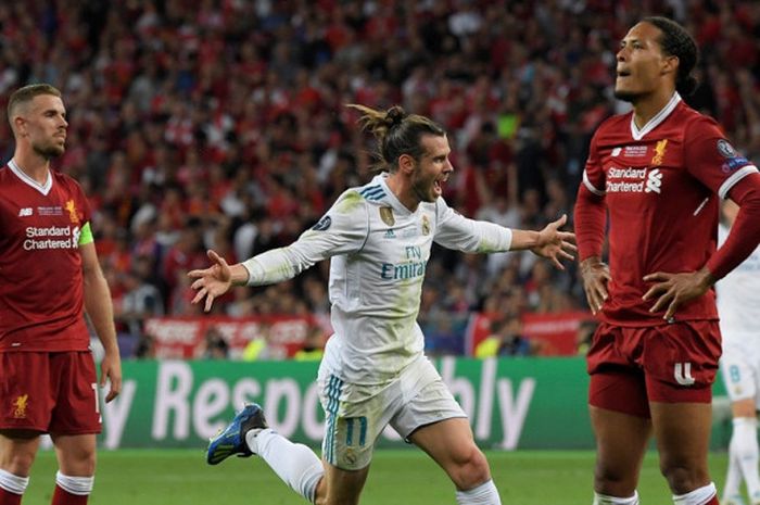   Penyerang Real Madrid, Gareth Bale (tengah), merayakan gol yang dicetak ke gawang Liverpool FC dalam laga final Liga Champions di Stadion NSC Olimpiyskiy, Kiev, Ukraina pada 26 Mei 2018.  