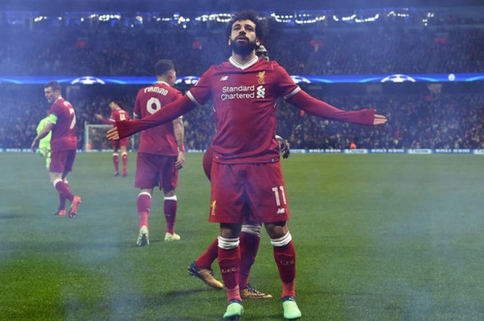 Pemain sayap Liverpool FC, Mohamed Salah, merayakan golnya ke gawang Manchester City dalam laga leg kedua perempat final Liga Champions di Stadion Etihad, Manchester, Inggris pada 10 April 2018.