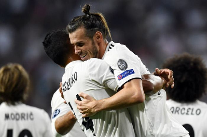 Winger Real Madrid, Gareth Bale, melakukan selebrasi setelah menjebol gawang AS Roma pada laga Liga Champions di Santiago Bernabeu, Rabu (19/9/2018)