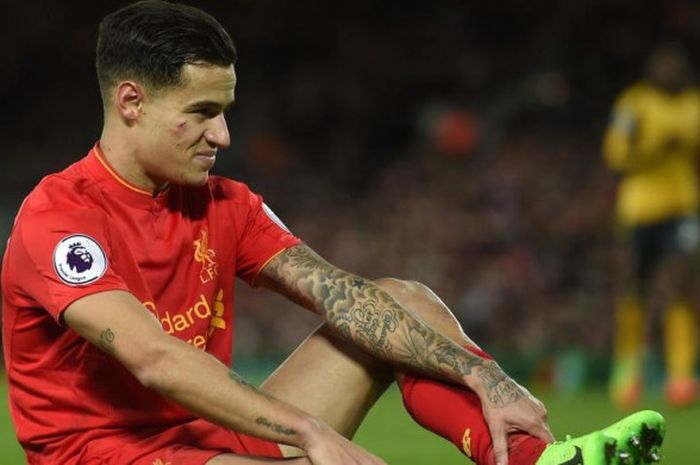 Reaksi Philippe Coutinho dalam partai Liga Inggris antara Liverpool lawan Arsenal di Stadion Anfield, 4 Maret 2017.