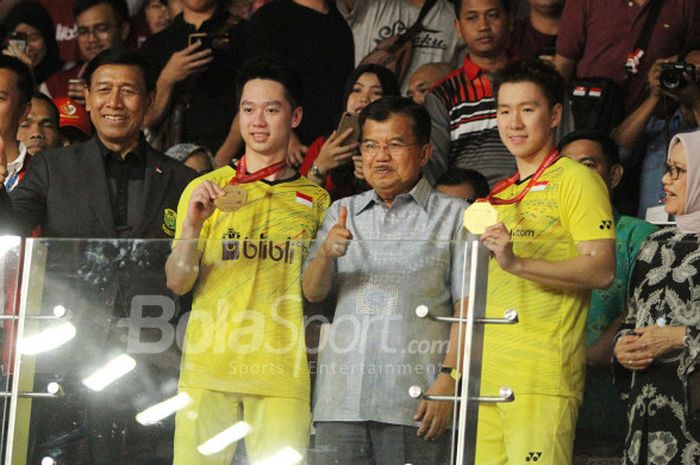 Pasangan ganda putra Indonesia, Marcus Fernaldi Gideon/Kevin Sanjaya Sukamuljo, pada final Indonesia Masters 2018 di Istora Senayan, Jakarta, Minggu (28/1/2018).