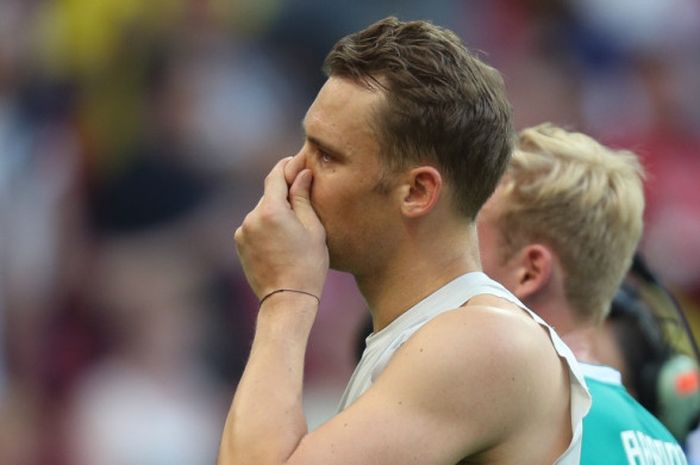 Ekspresi kiper Jerman, Manuel Neuer, seusai laga Grup F Piala Dunia 2018 kontra Korea Selatan di Kazan Arena, Kazan, Rusia pada 27 Juni 2018.