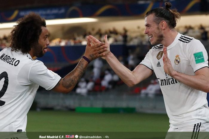 Penyerang Real Madrid, Gareth Bale (kanan), merayakan golnya bersama Marcelo dalam laga semifinal Piala Dunia Antarklub melawan Kashima Antlers di Stadion Sheikh Zayed Sports City, Abu Dhabi, Uni Emirat Arab pada 19 Desember 2018.