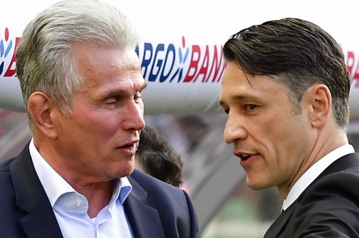 Pelatih Eintracht Frankfurt, Niko Kovac (kanan), berbincang dengan pelatih Bayern Muenchen, Jupp Heynckes, jelang laga final DFB Pokal 2017-2018 di Olympiastadion, Berlin, Jerman, pada Sabtu (19/5/2018).